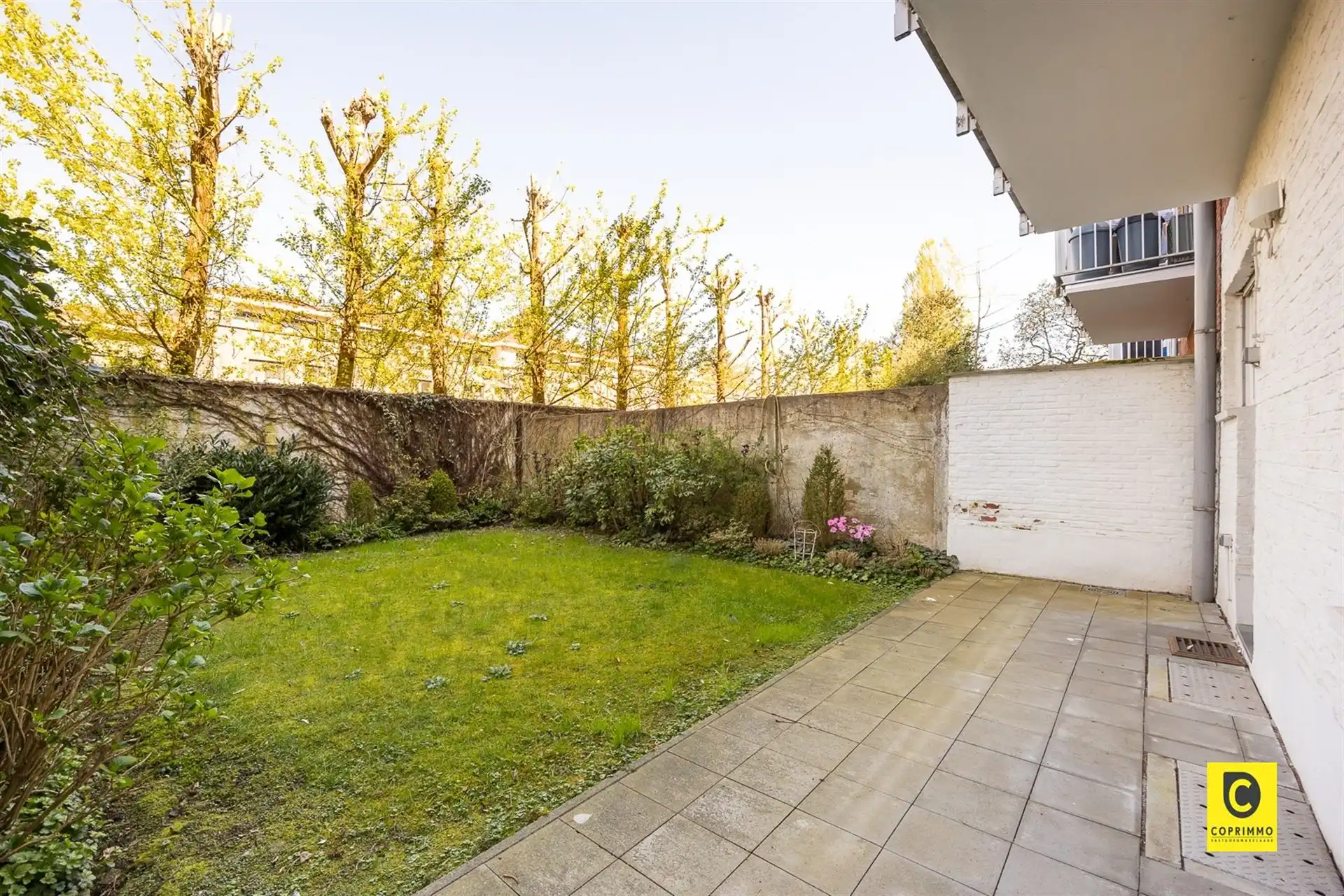 Charmant gelijkvloers appartement met tuin! foto 7