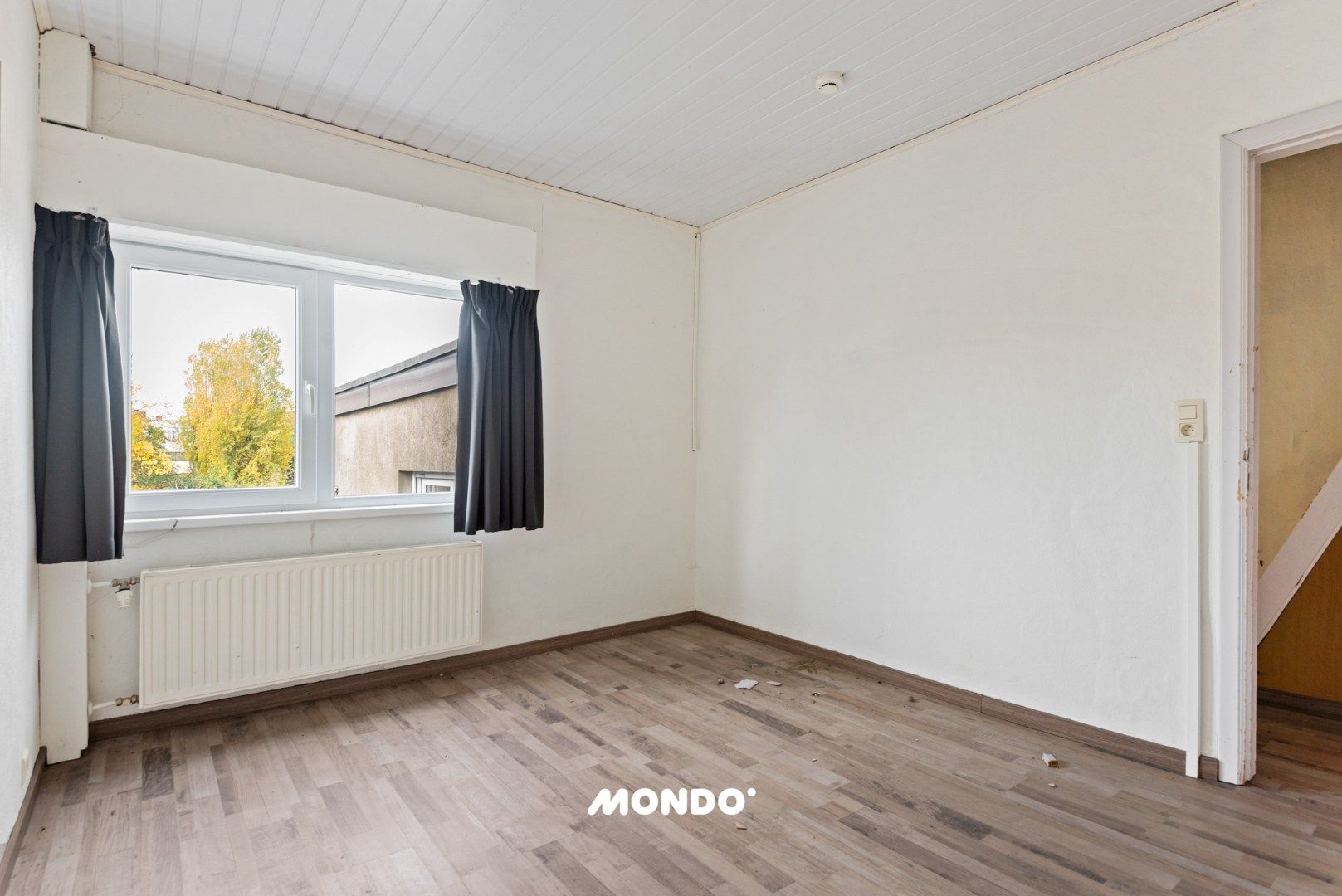 Rustig gelegen woning met 3 slaapkamers en veel potentieel nabij het centrum! foto 14