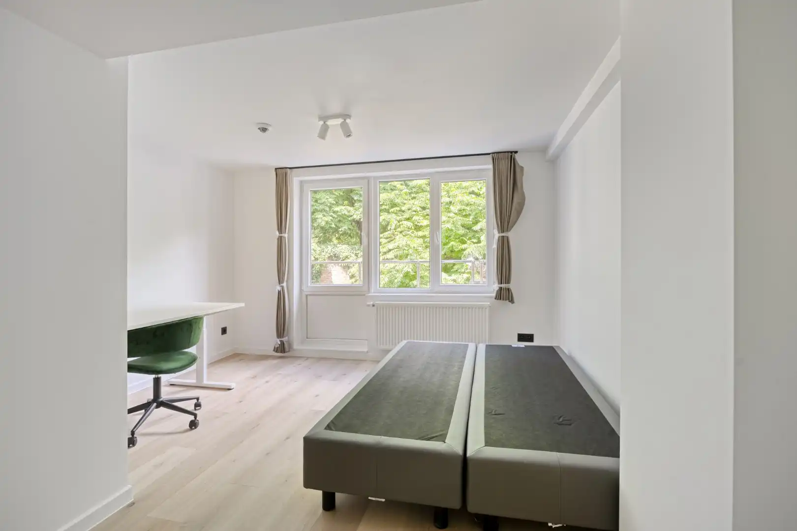 Volledig gerenoveerde studentenkamer in residentie met 15 studentenkamers en een 1slaapkamer appartement in hartje Leuven - EPC label A! foto {{pictureIndex}}