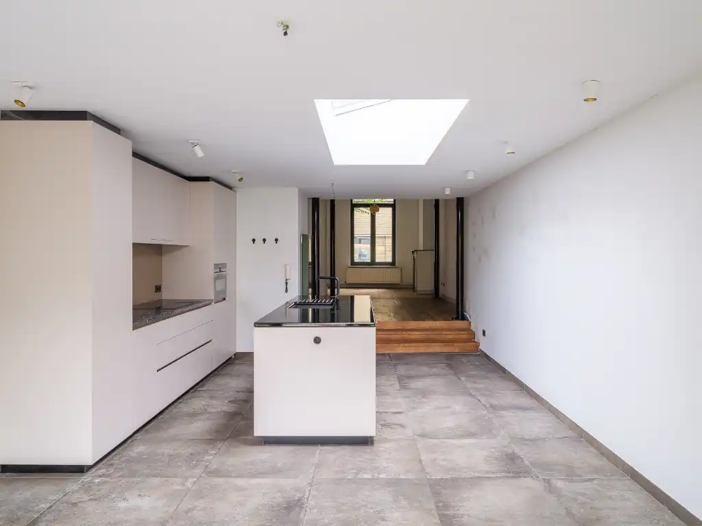 Instapklare stadswoning met drie slaapkamers en aangename tuin nabij Gent-Sint-Pieters. foto 8