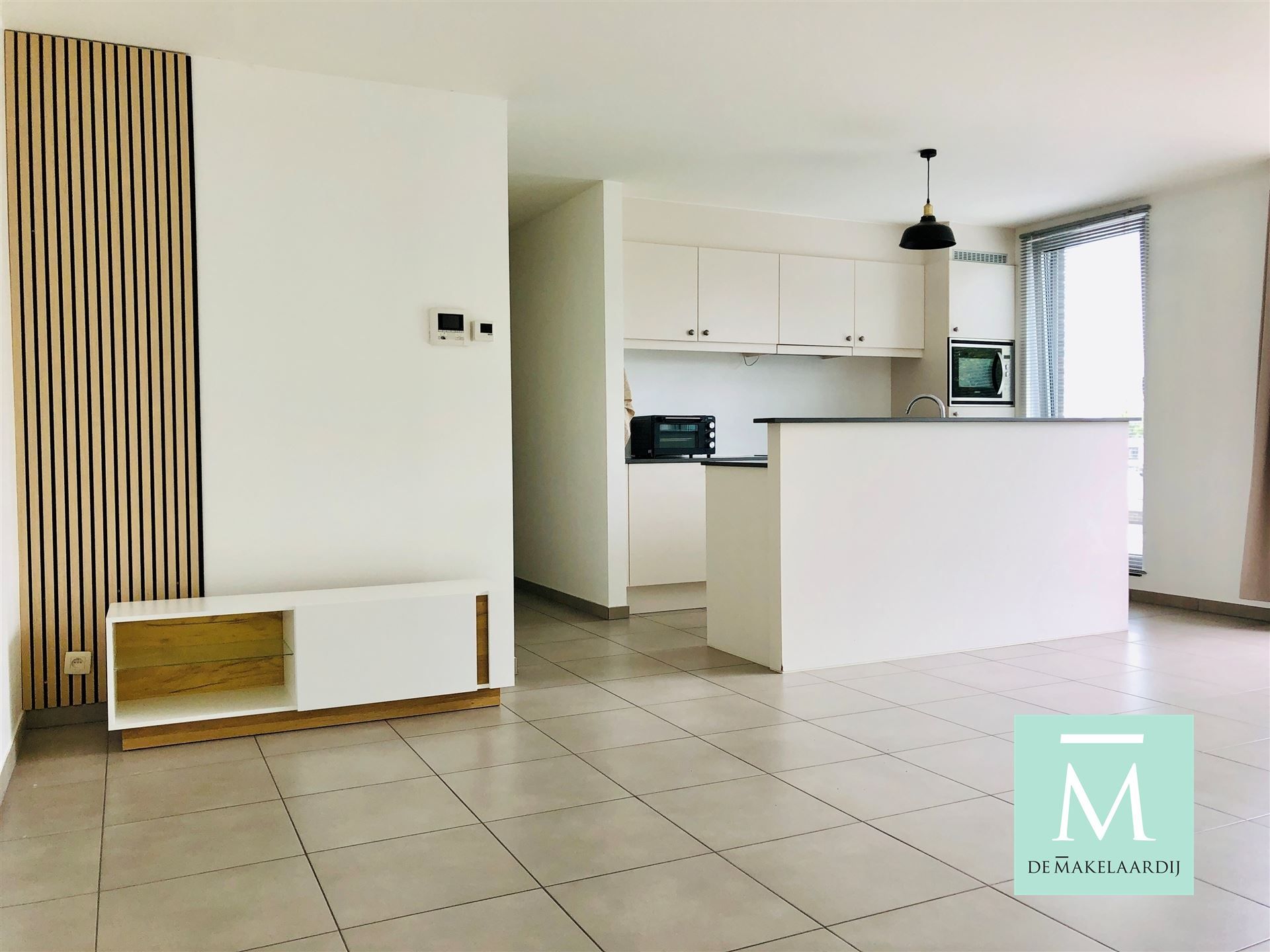 Uitstekend gelegen appartement met 2 slaapkamers in het centrum van Onze-Lieve-Vrouw-Waver foto {{pictureIndex}}
