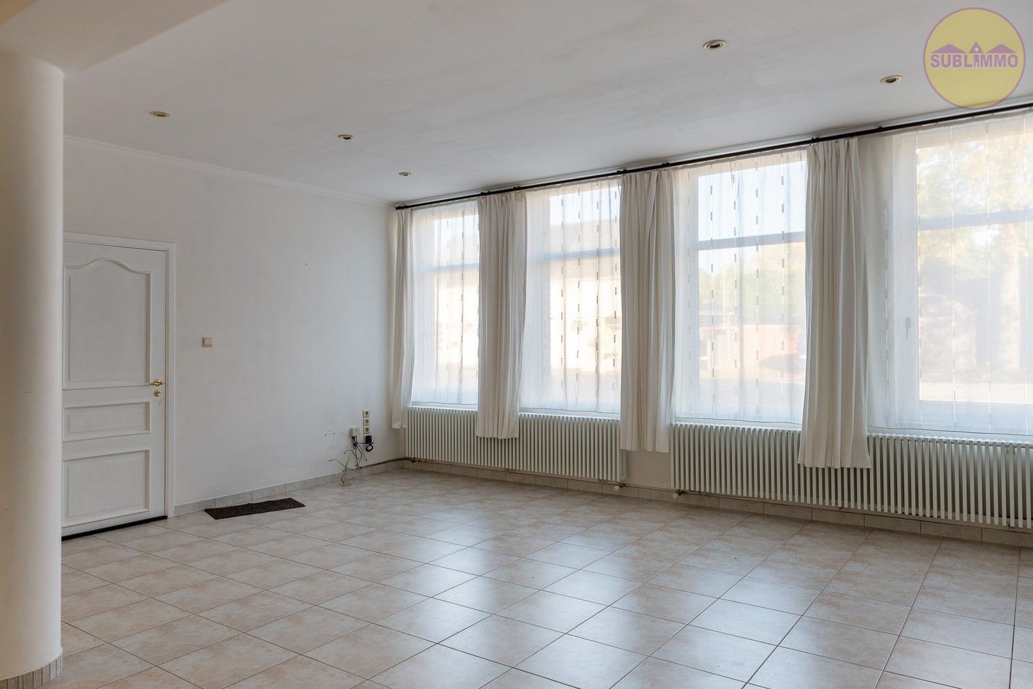 Ruime woning met afzonderlijk appartement op een perceel van 858 m² in Mol. foto 4
