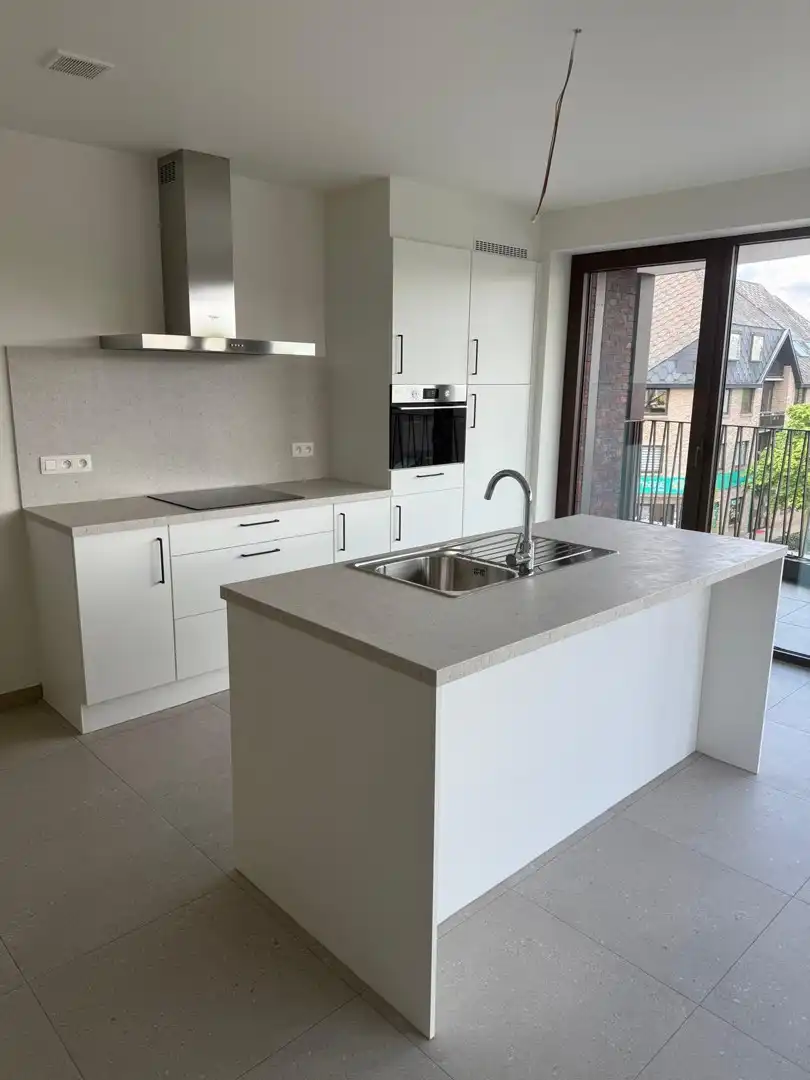 Nieuwbouwappartement met 2 slaapkamers en ruim terras in centrum Houthalen foto 4
