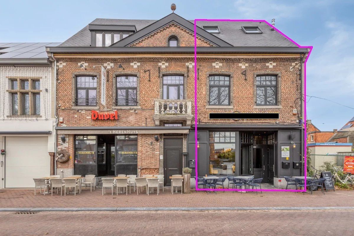 Zeer ruim handelspand met tuin en exclusief triplex  appartement met privé-lift en 2 slaapkamers, garage en staanplaats. foto {{pictureIndex}}