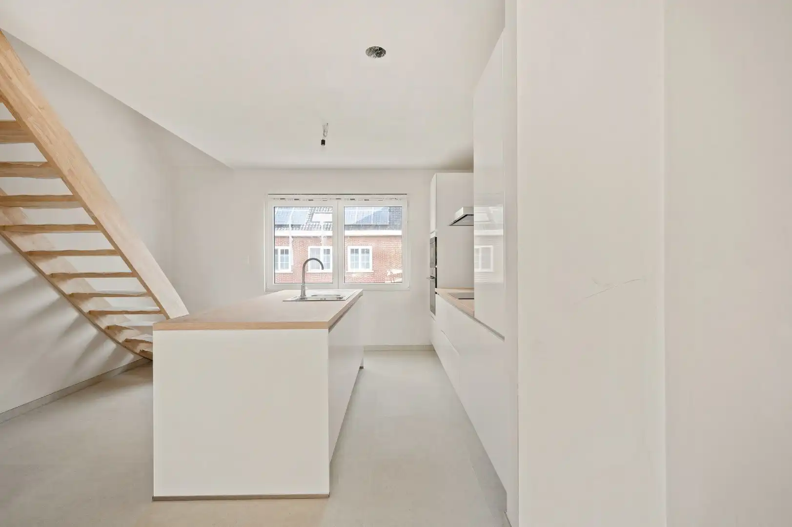 DUPLEX NIEUWBOUWAPPARTEMENT MET 2 SLPKS EN RUIM TERRAS TE GELUWE foto 9