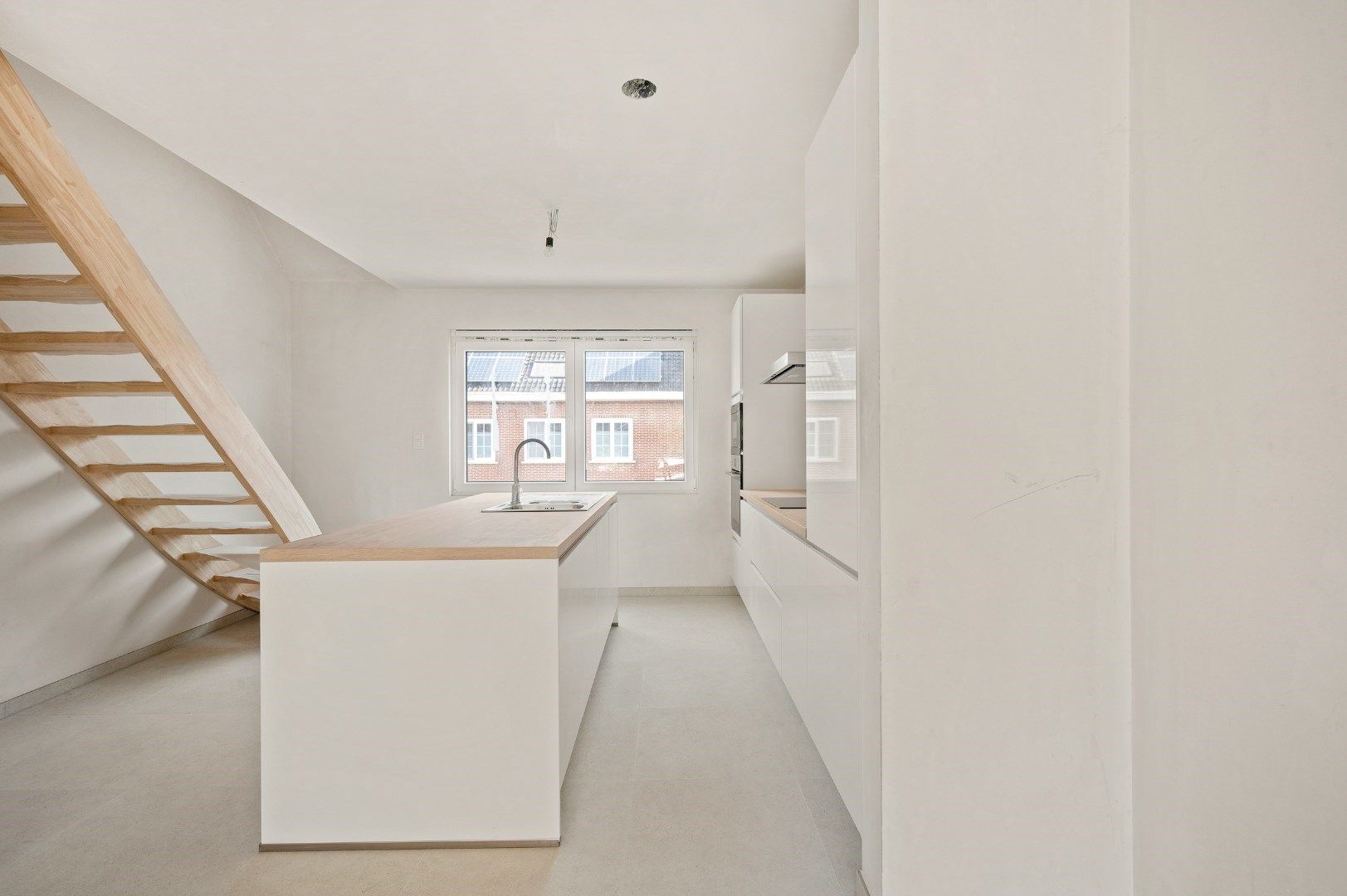 DUPLEX NIEUWBOUWAPPARTEMENT MET 2 SLPKS EN RUIM TERRAS TE GELUWE foto 8