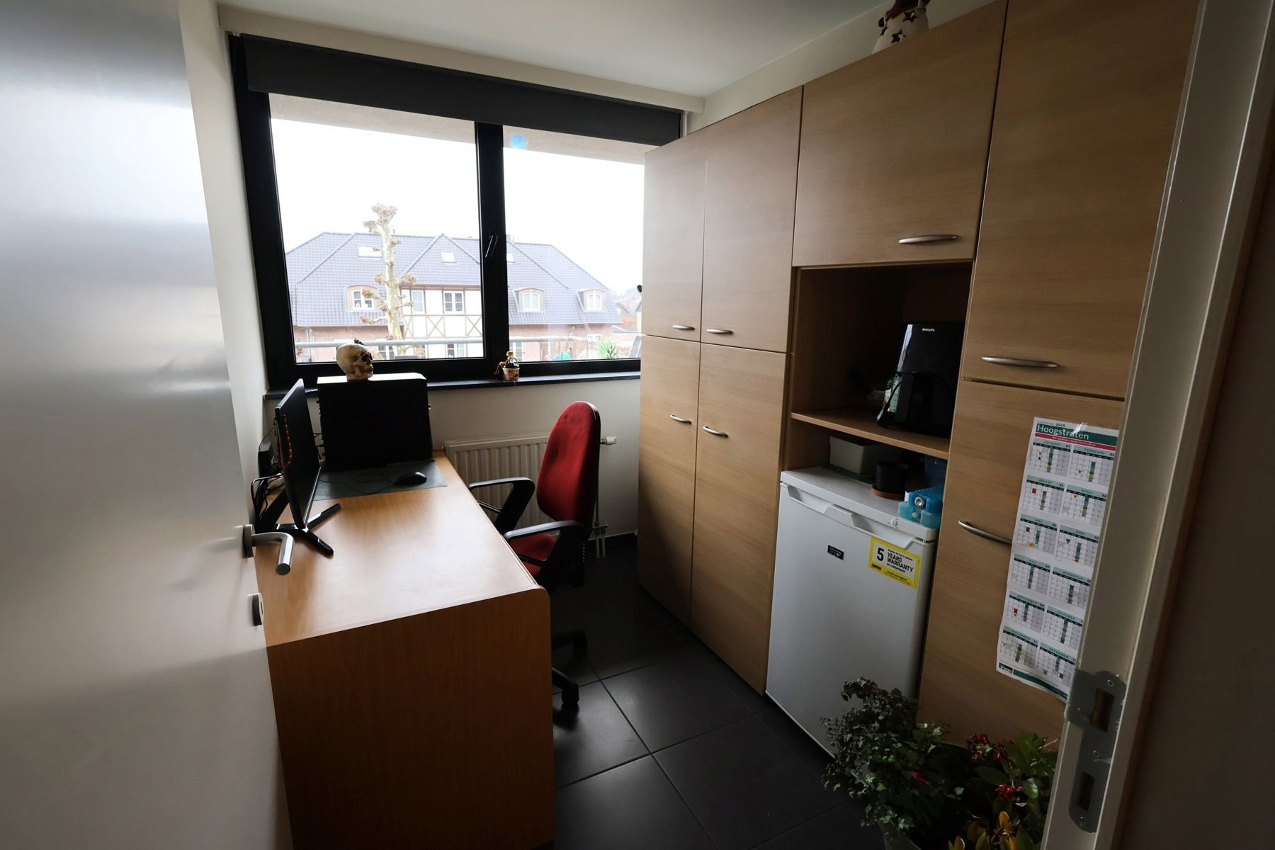 Appartement op de 2de verdieping met terras, kelderberging en autostaanplaats. foto 11