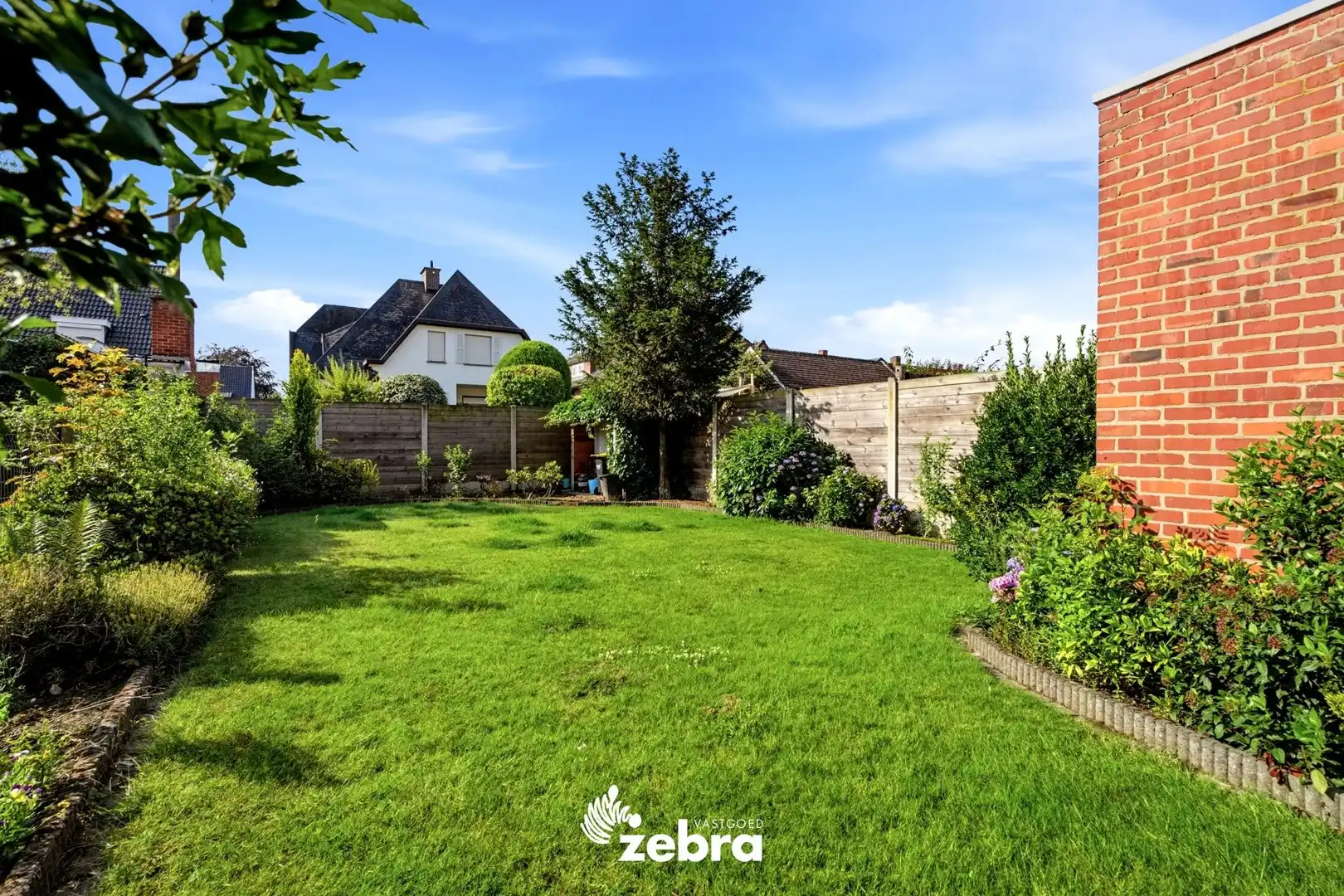 Ruime gezinswoning met 3 slaapkamers, ingerichte zolder, garage en tuin! foto 24