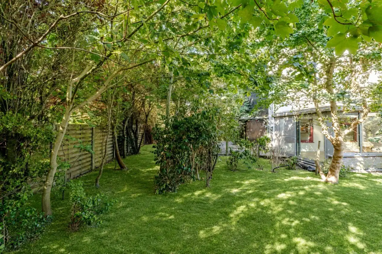 Op te frissen woning met perceel bouwgrond foto 21