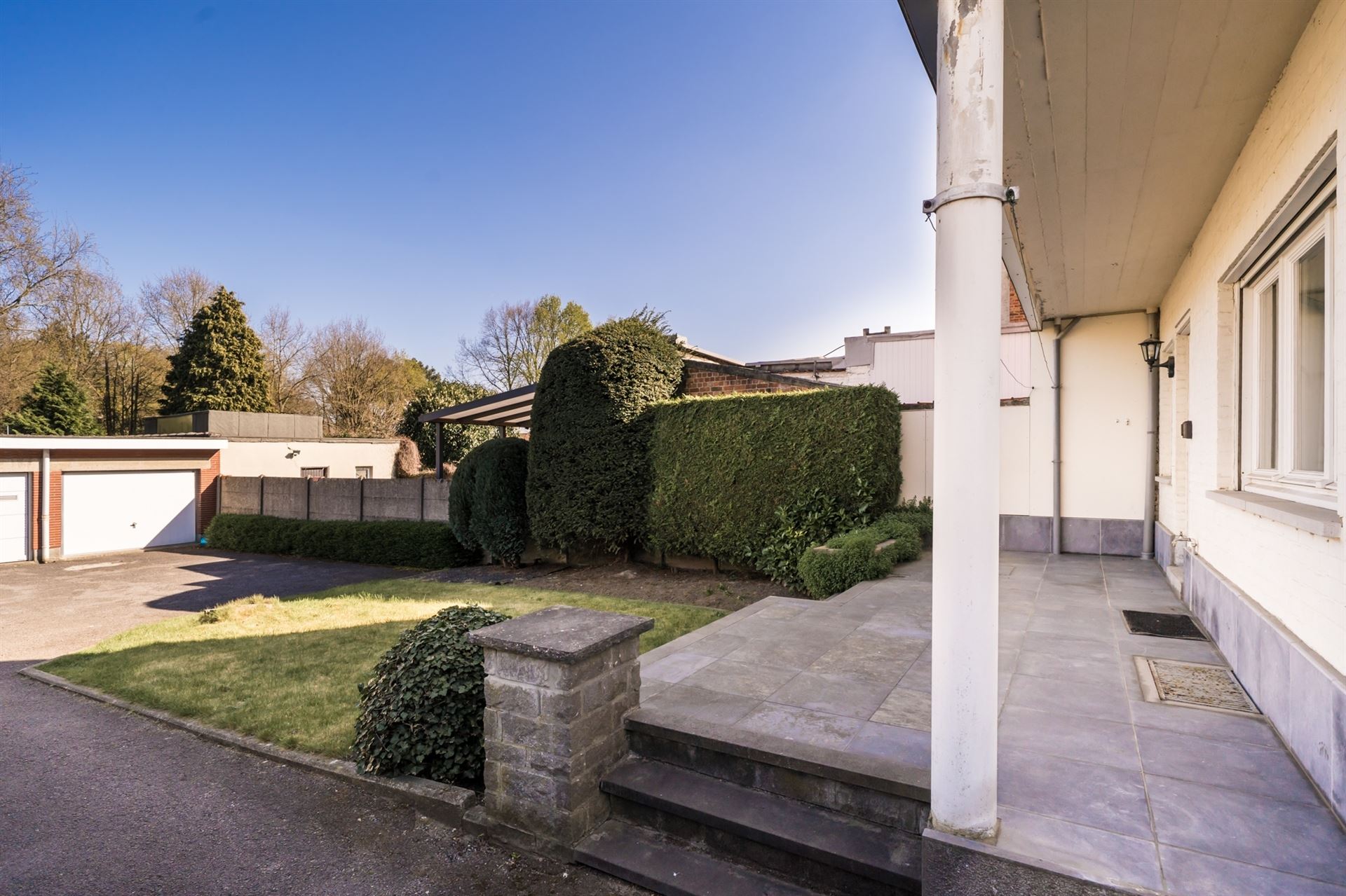 Gelijkvloers app met 2 slpk, terras en garage (€ 25.000) foto 17