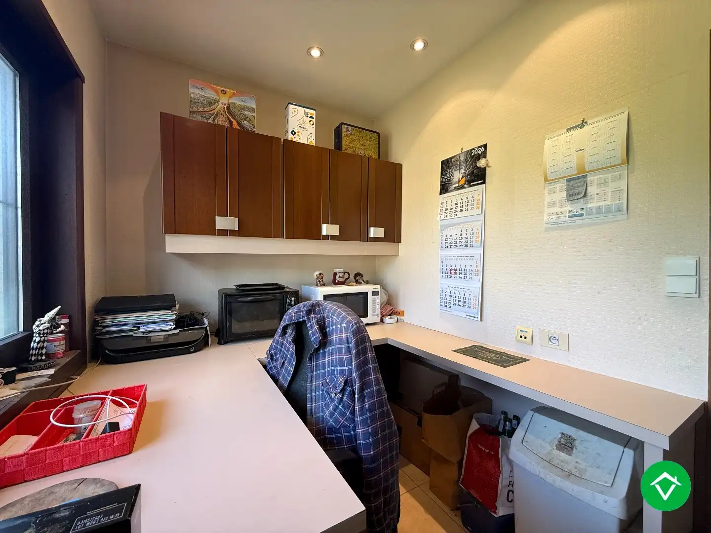 Rustig gelegen gelijkvloerse halfopen woning met 2 slpk's + dubbele garage foto 9