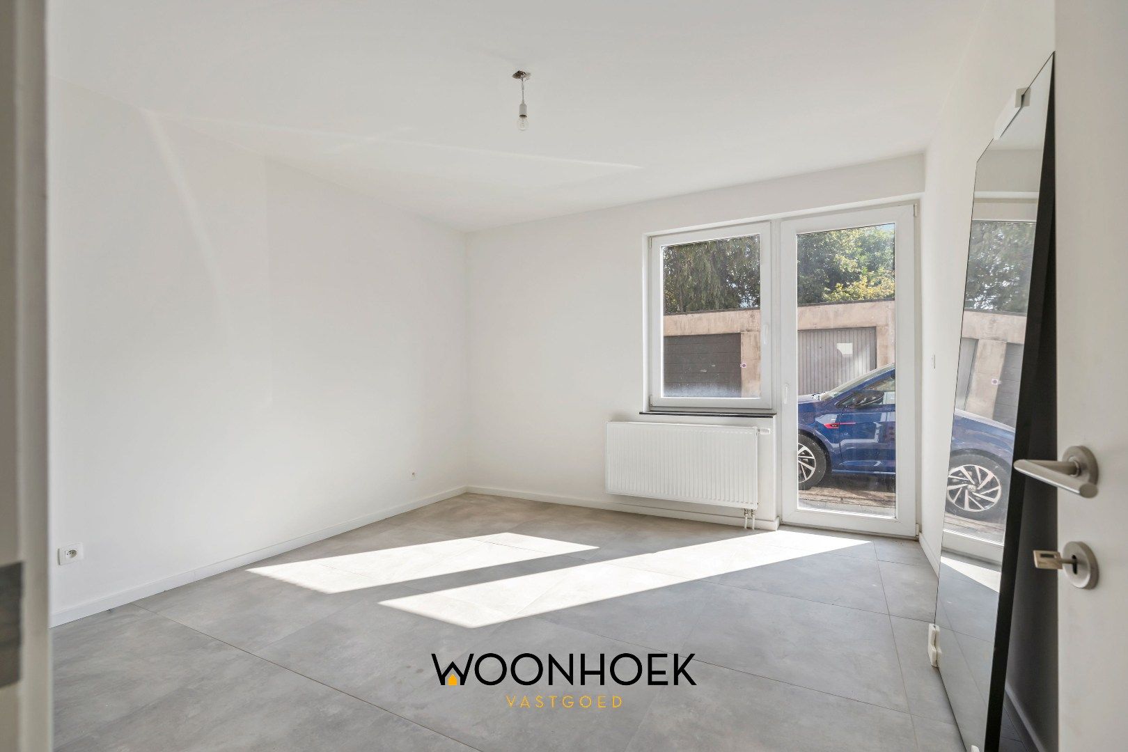Gerenoveerd appartement op toplocatie te Belsele! foto 9