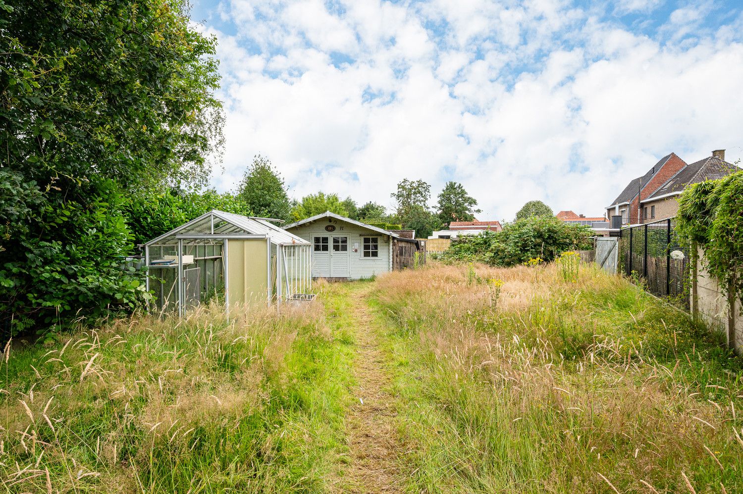 Te renoveren starterswoning te koop in Balgerhoeke met een verrassend ruime tuin! foto 16