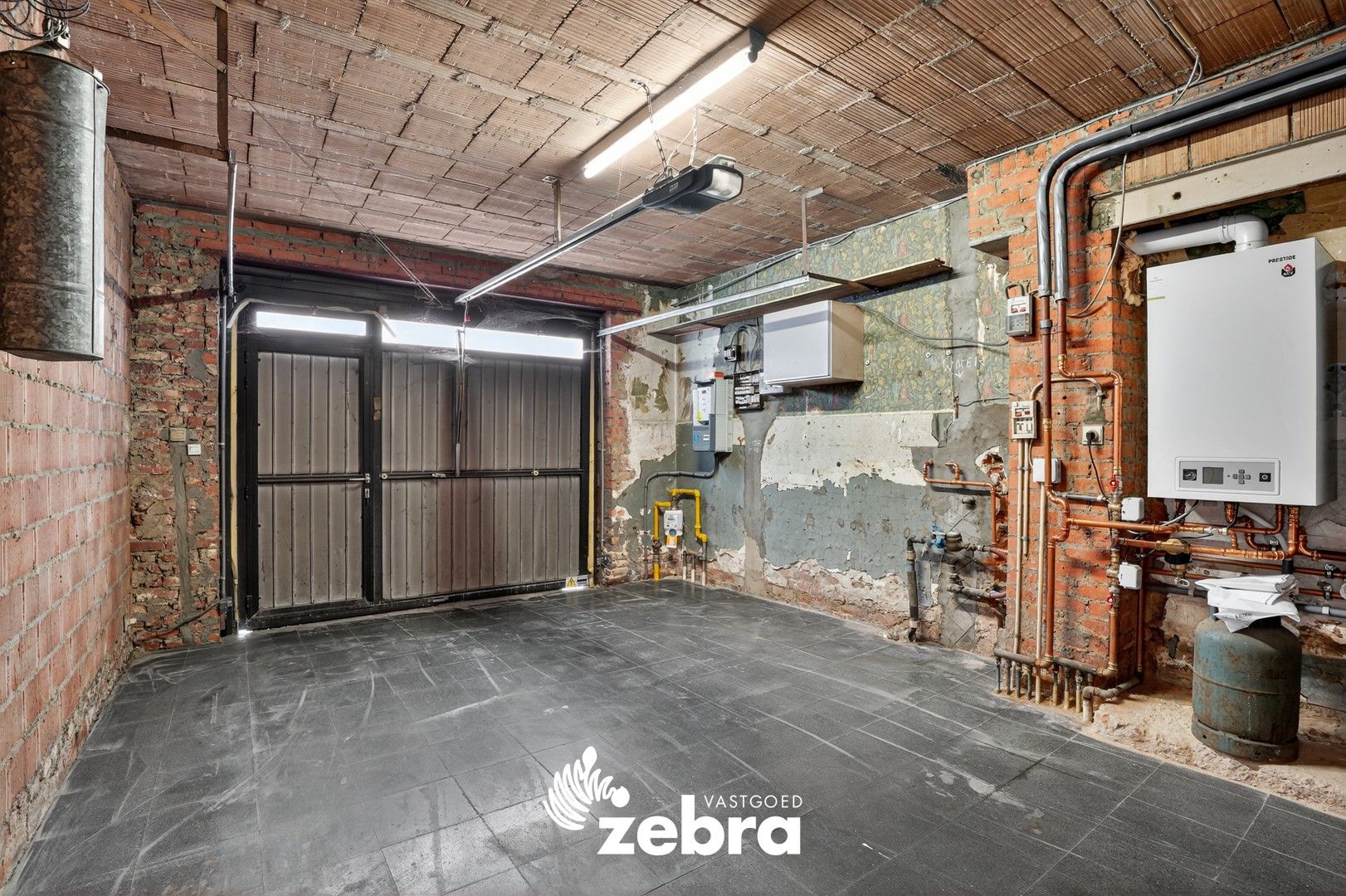 Zeer ruime woning met inpandige garage te koop in Staden! foto 12