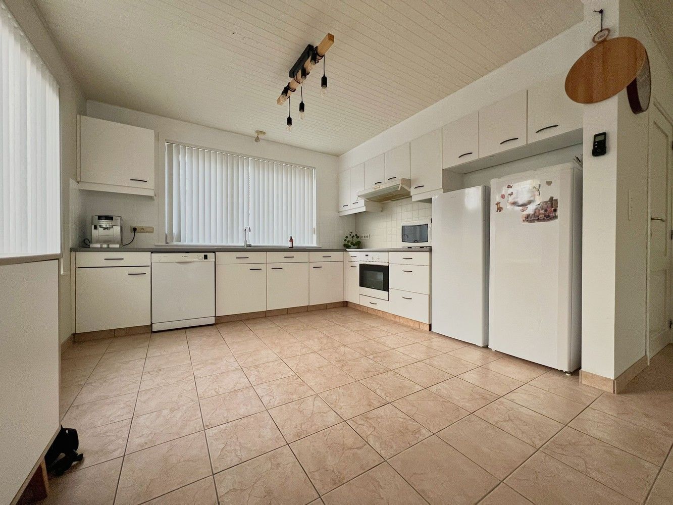 Ruime, lichtrijke woning met zonnige tuin+ aparte garage foto 6