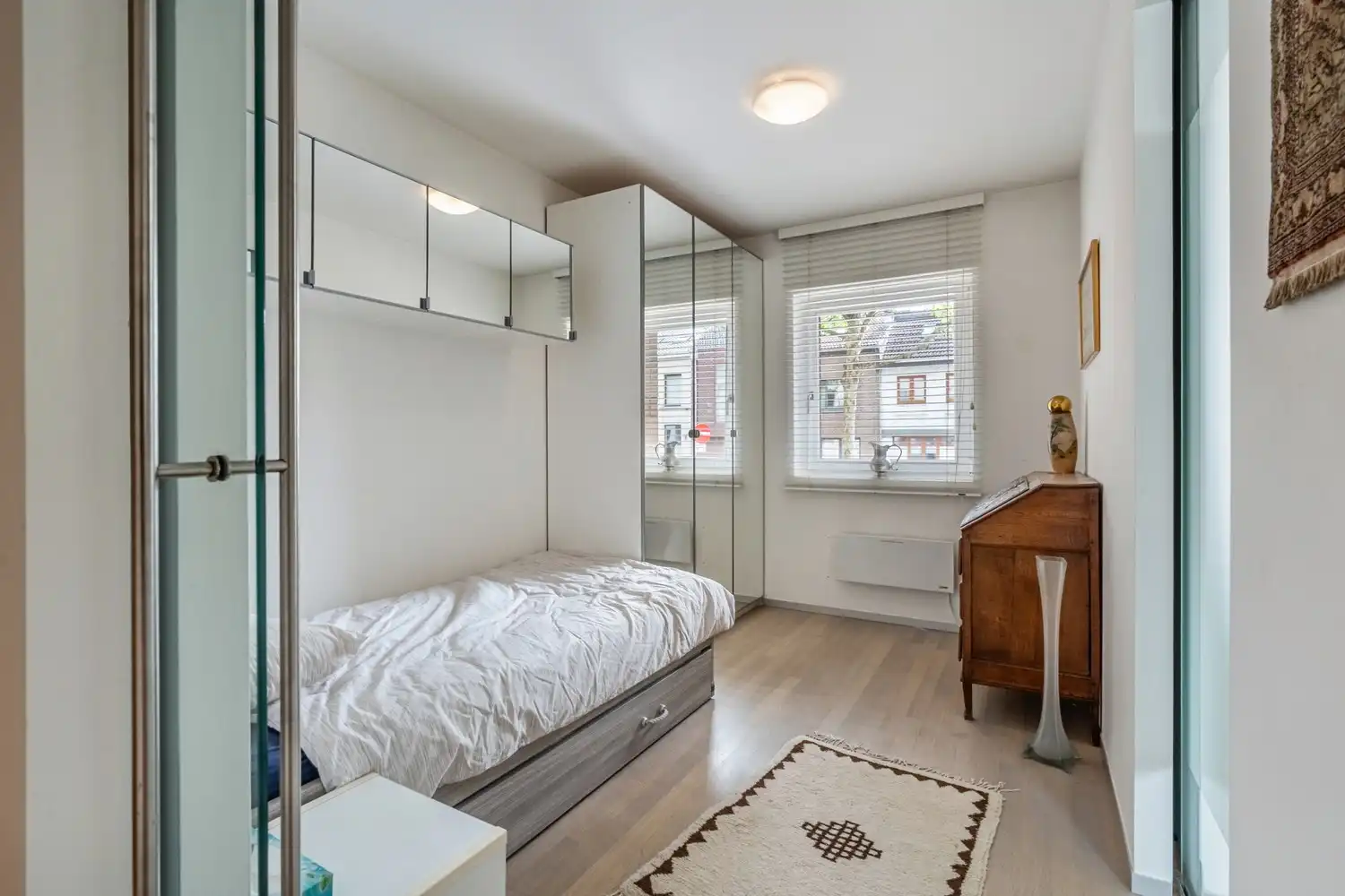 Ruim, modern en gelijkvloers appartement met 3 slaapkamers, een groot terras, 2 autostaanplaatsen en 2 kelders te centrum Leuven! foto 19