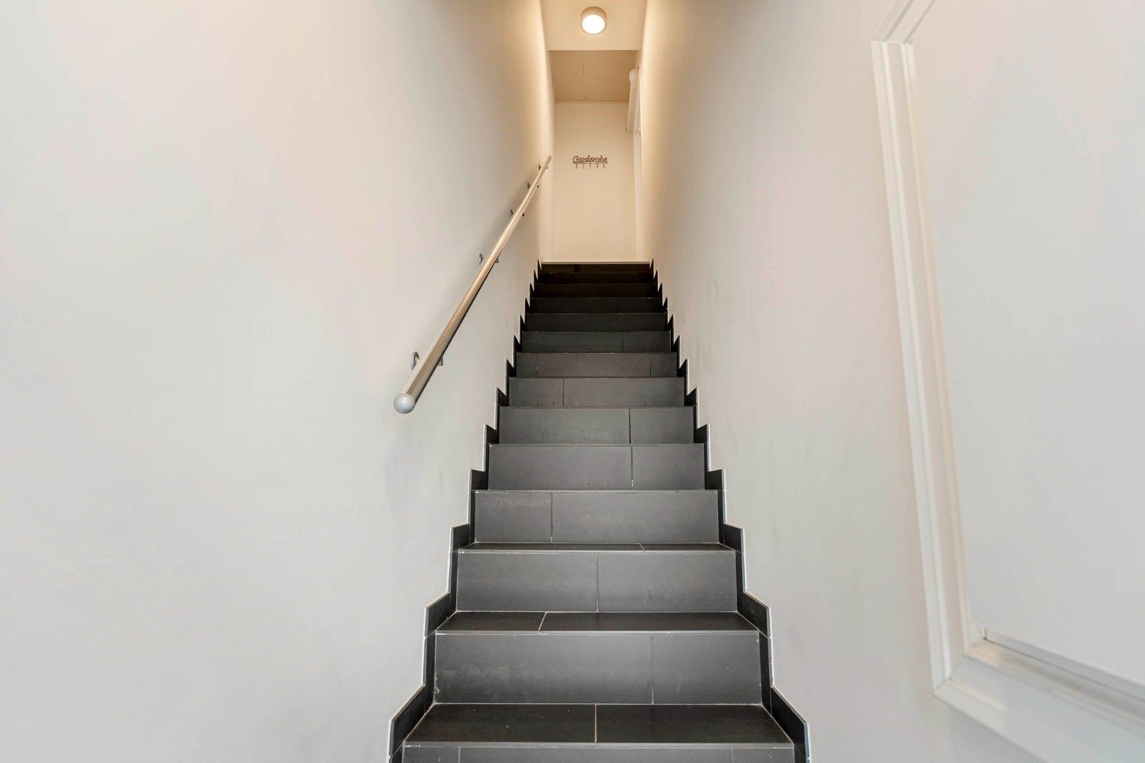 Energiezuinig 1-slaapkamerappartement met private toegang en knusse patio, centrum  Opglabbeek - interessante investeringsopportuniteit. foto 4