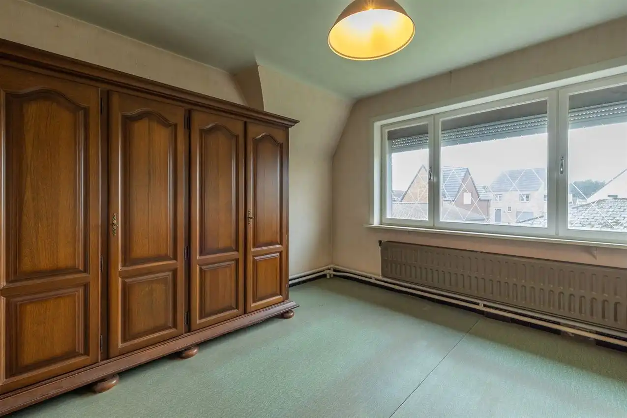 Vlakbij ingang merodebossen, soldie woning met potentieel foto 21