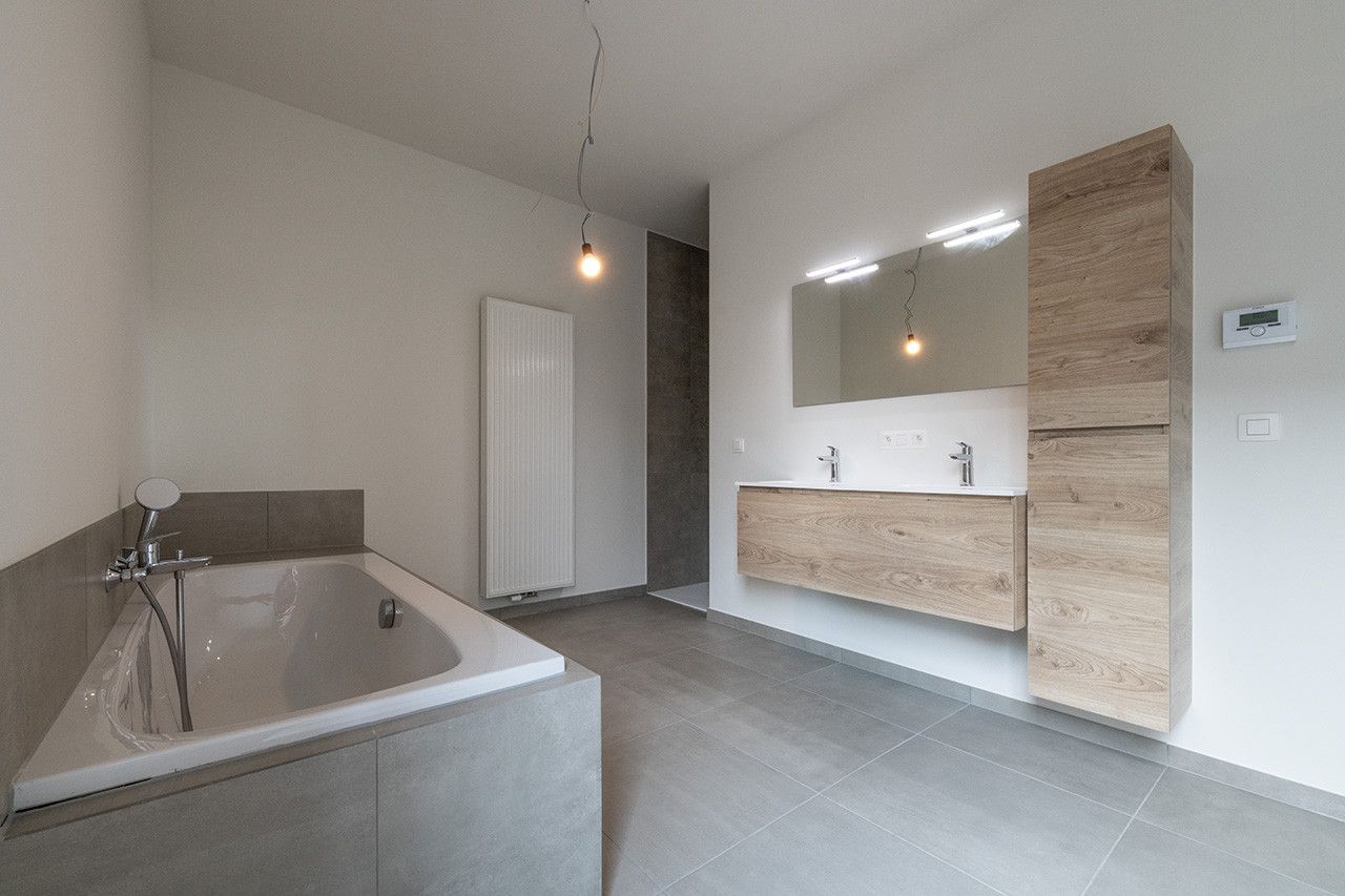 Zeer ruime en lichtrijke stadswoning met 3 of 4 slaapkamers foto 11