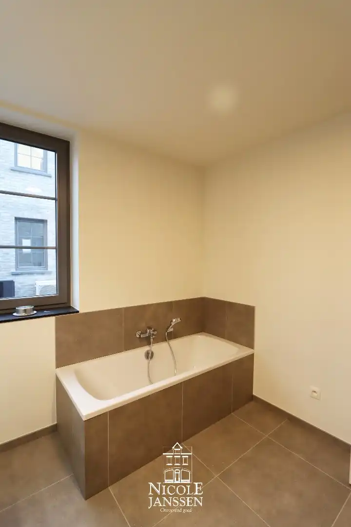 Nieuwbouwwoning met carport foto 12