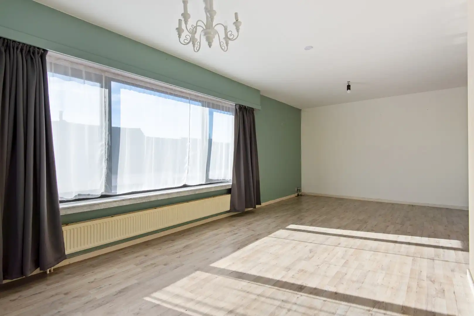 Ruim en lichtrijk 2-slaapkamerappartement in hartje Wijnegem foto 5