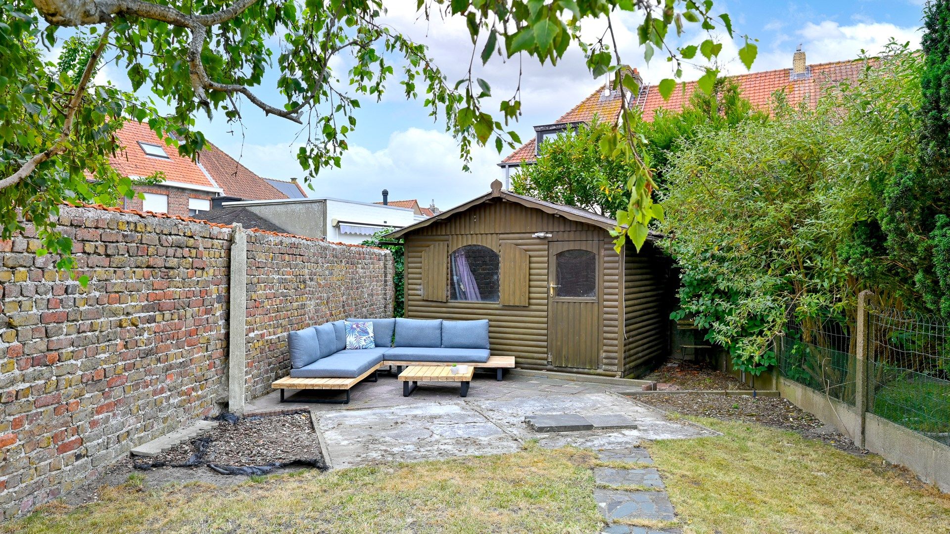 Handelshuis met grote tuin in het dorp van Zeebrugge foto 2