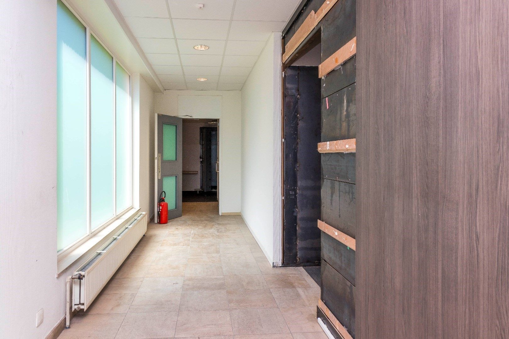 Ruim duplexappartement met gelijkvloerse handelsruimte foto 23