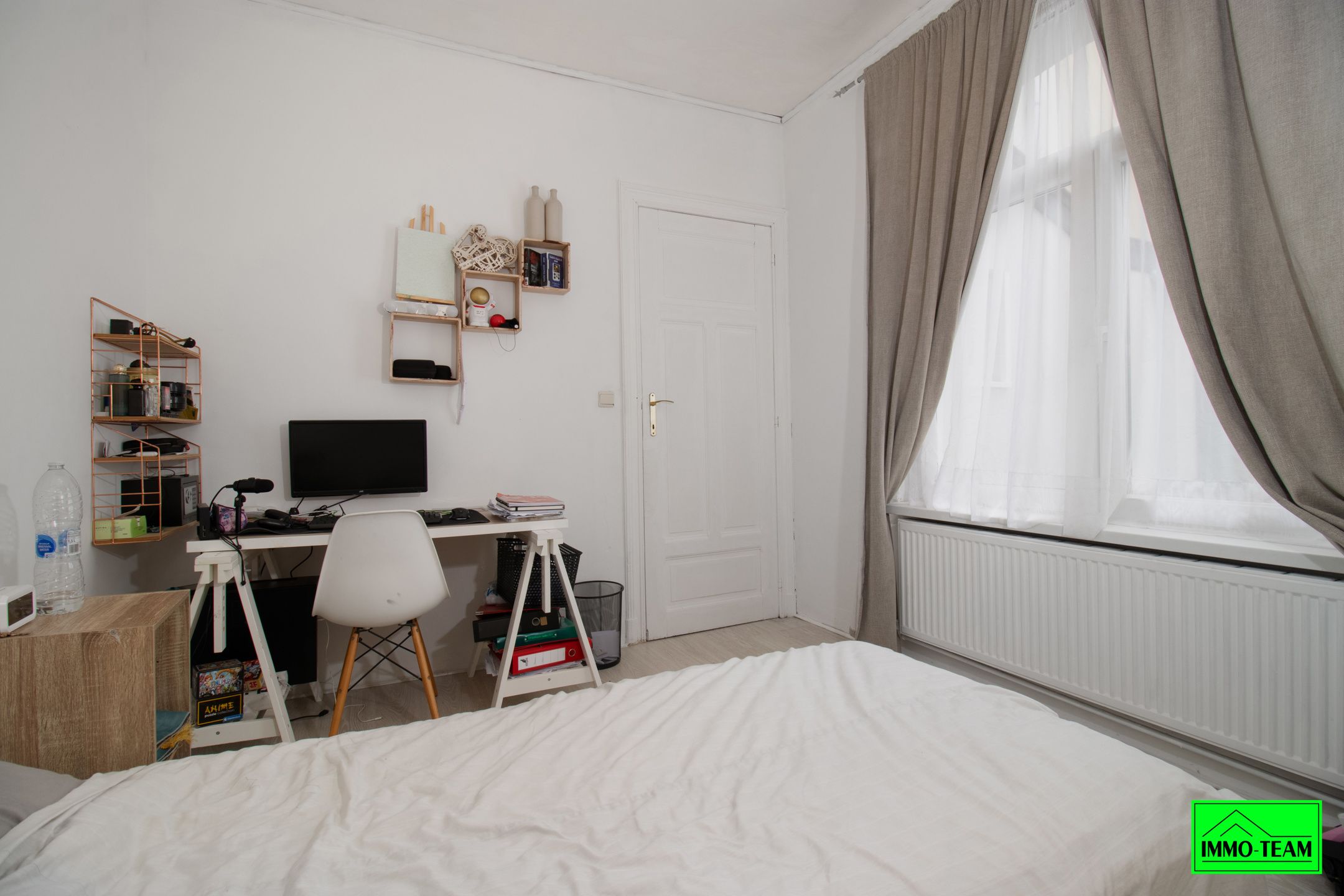 Opbrengsteigendom met handelszaak en 2 duplexappartementen foto 10