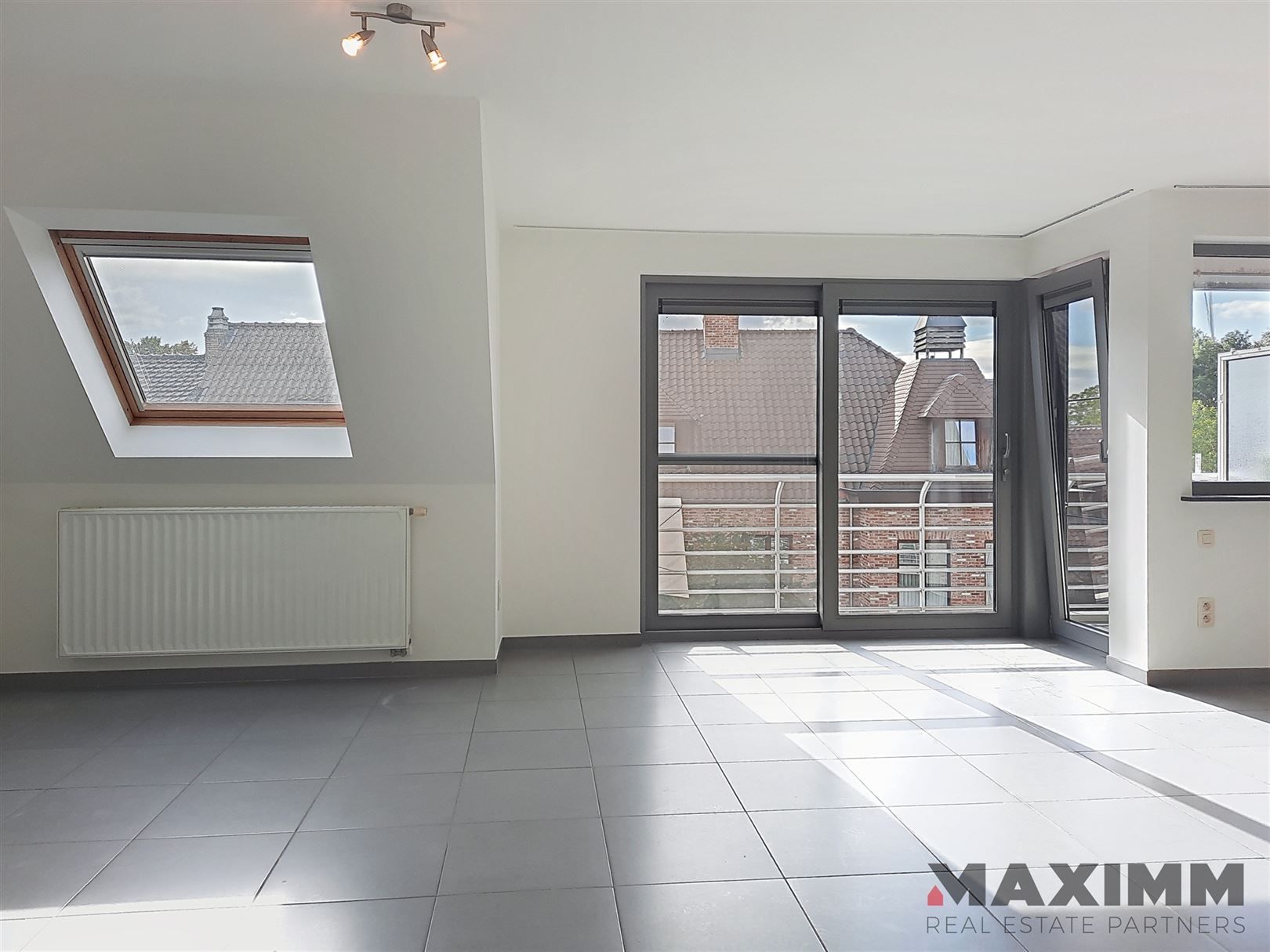 duplex woonst, 110m², terras voor- en achterzijde, garagebox en berging. foto 3