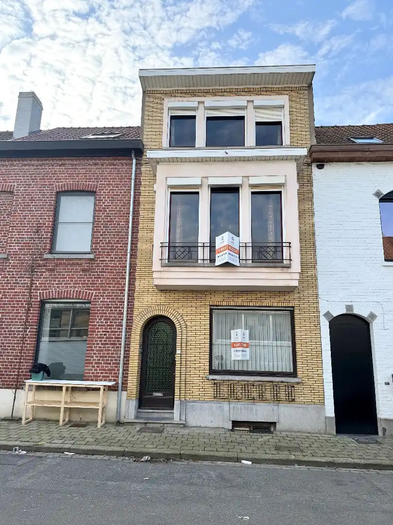 Te renoveren rijwoning met 4 slaapkamers en tuin in Kortrijk foto 18
