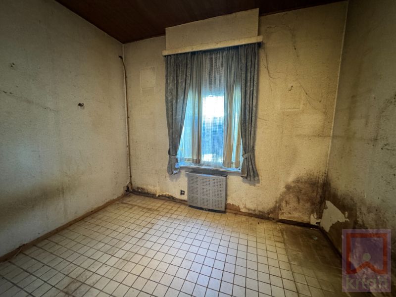 Te renoveren woning/bouwgrond op 342m². foto 6