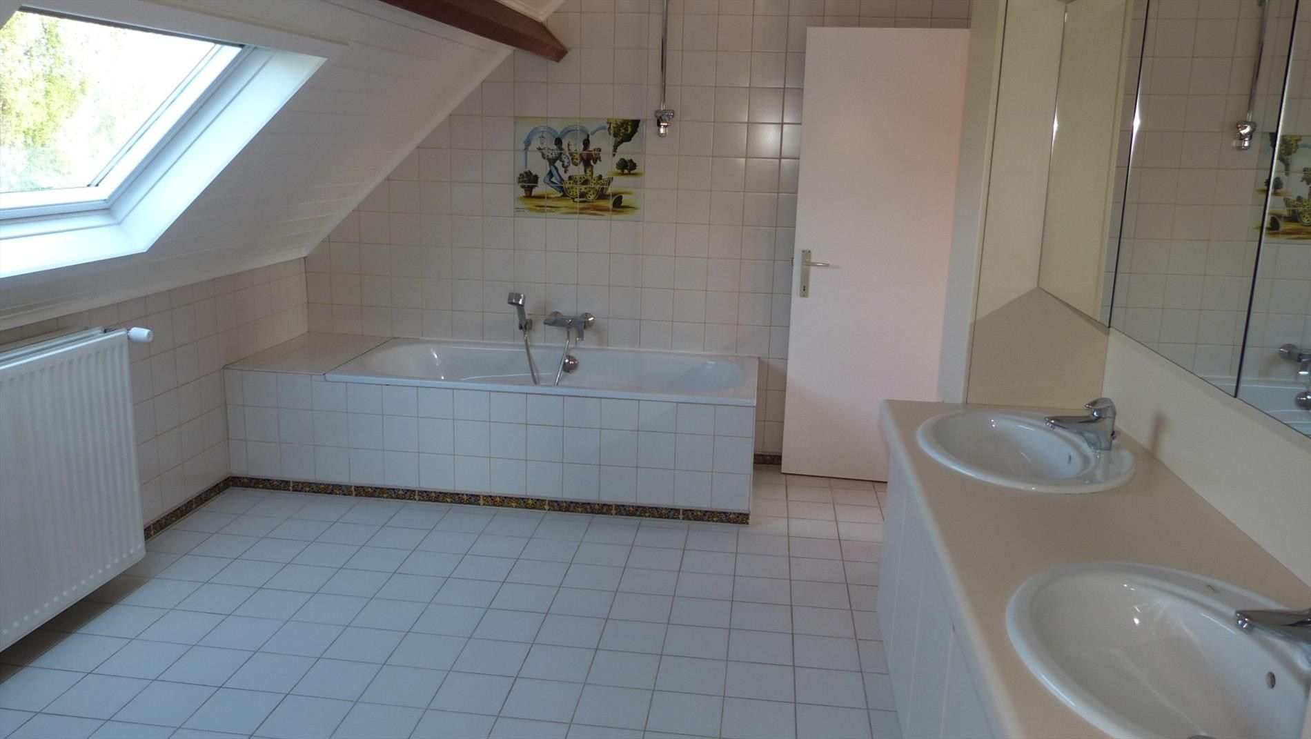 Alleenstaande woning met garage en tuin - rustige ligging foto 19