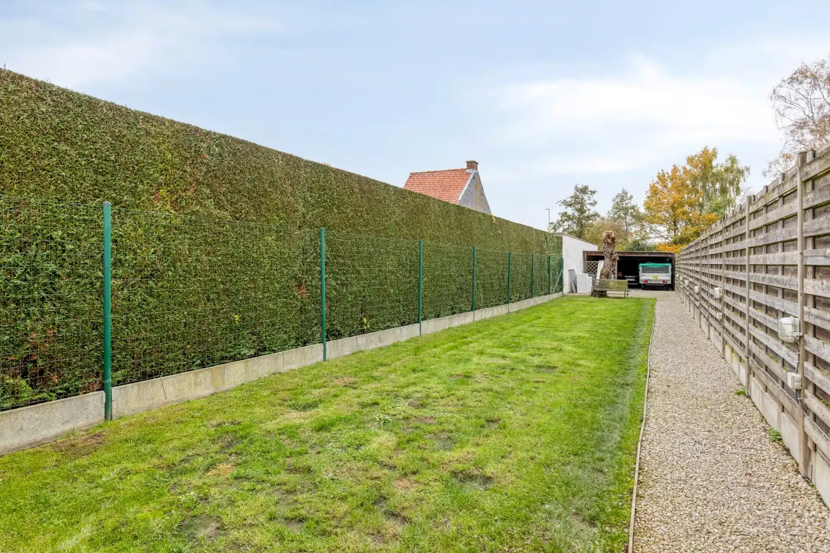 Verzorgde woning met diepe tuin, carport én uitweg! foto 20