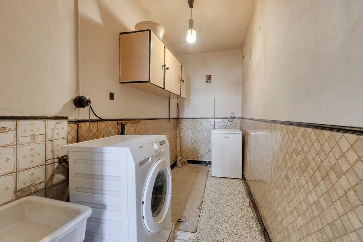 Te renoveren woning met veel potentieel op rustige ligging foto 7