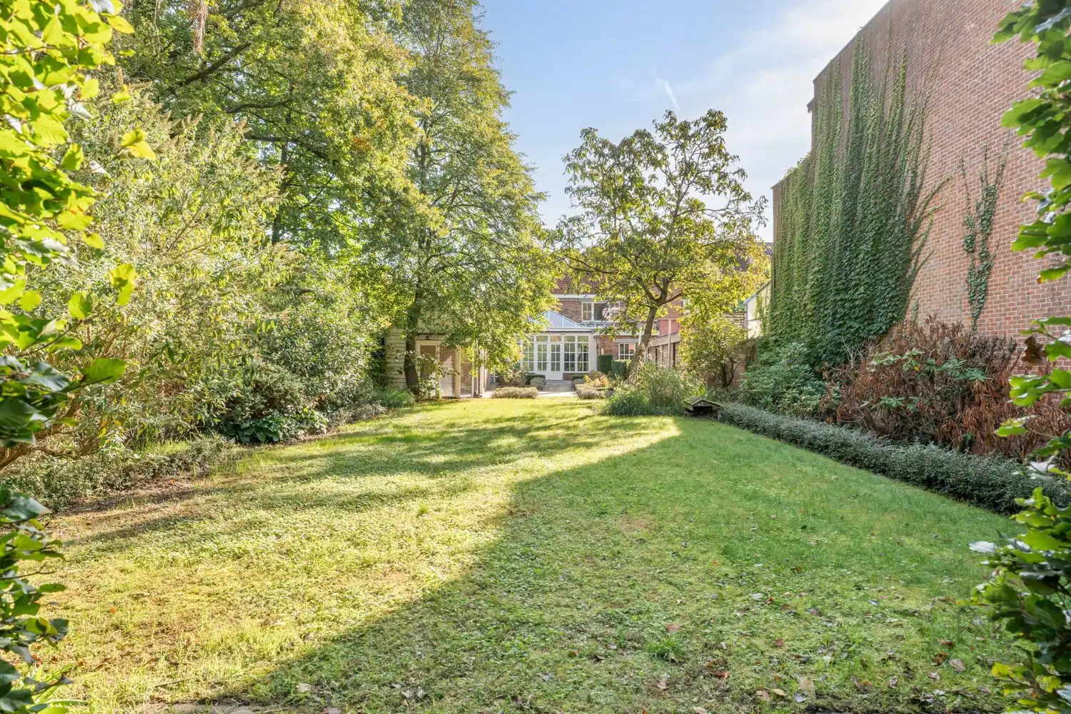 Karaktervolle woning met authentieke charme en lichtrijke tuinkamer! foto 8