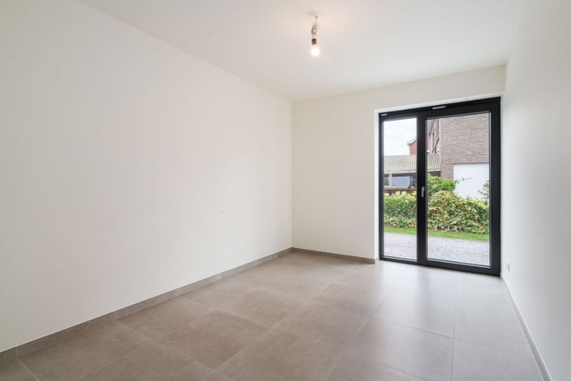 Dit appartement is gelegen langsheen de Langerbrugsestraat te Evergem. foto 9