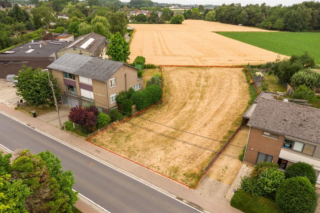 Bouwgrond OB met zicht op velden en avondzon foto {{pictureIndex}}