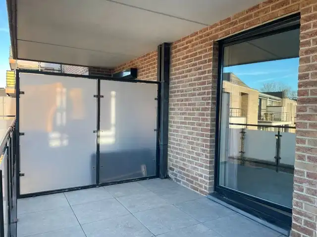 Ruim en energiezuinig appartement met twee terrassen en parking foto 2