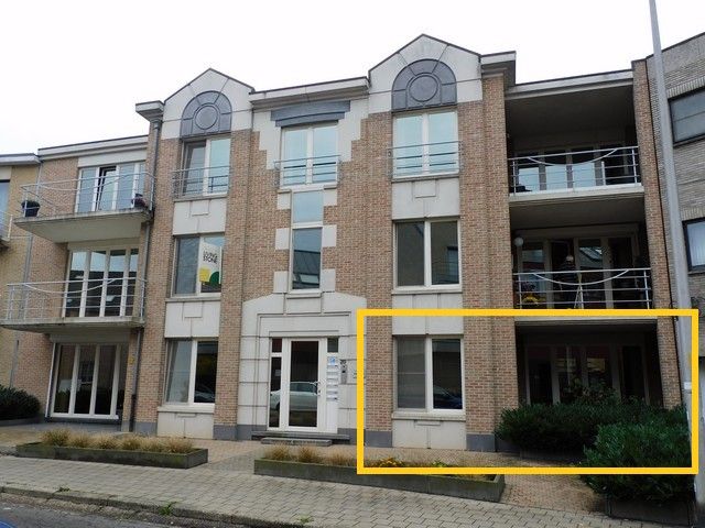 Prachtig gelijkvloers appartement in het centrum met garage   foto {{pictureIndex}}