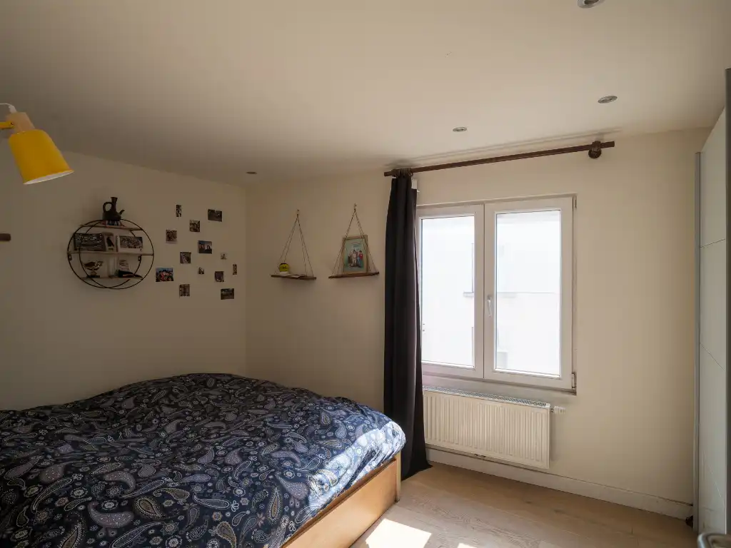 Hoekwoning met aangenaam volumespel, 3 slaapkamers, aparte fietsenberging en twee zongerichte terrassen, gelegen in de omgeving van Portus Ganda. foto 13