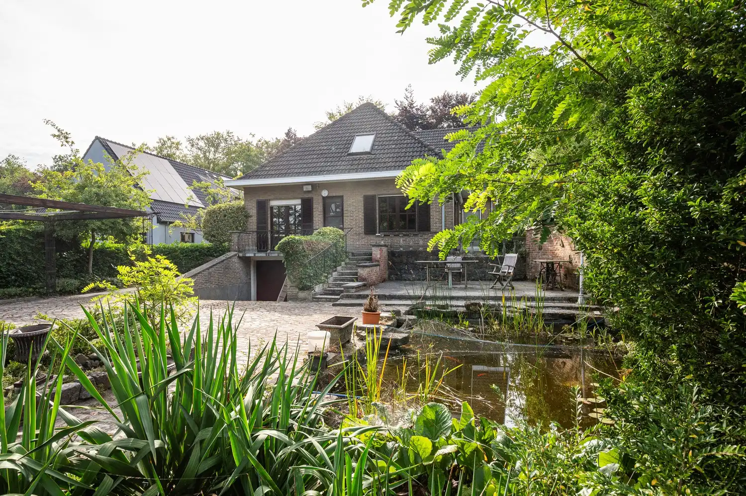 Vrijstaande villa op een uitzonderlijk groot perceel met bosgrond in Lembeke foto 32