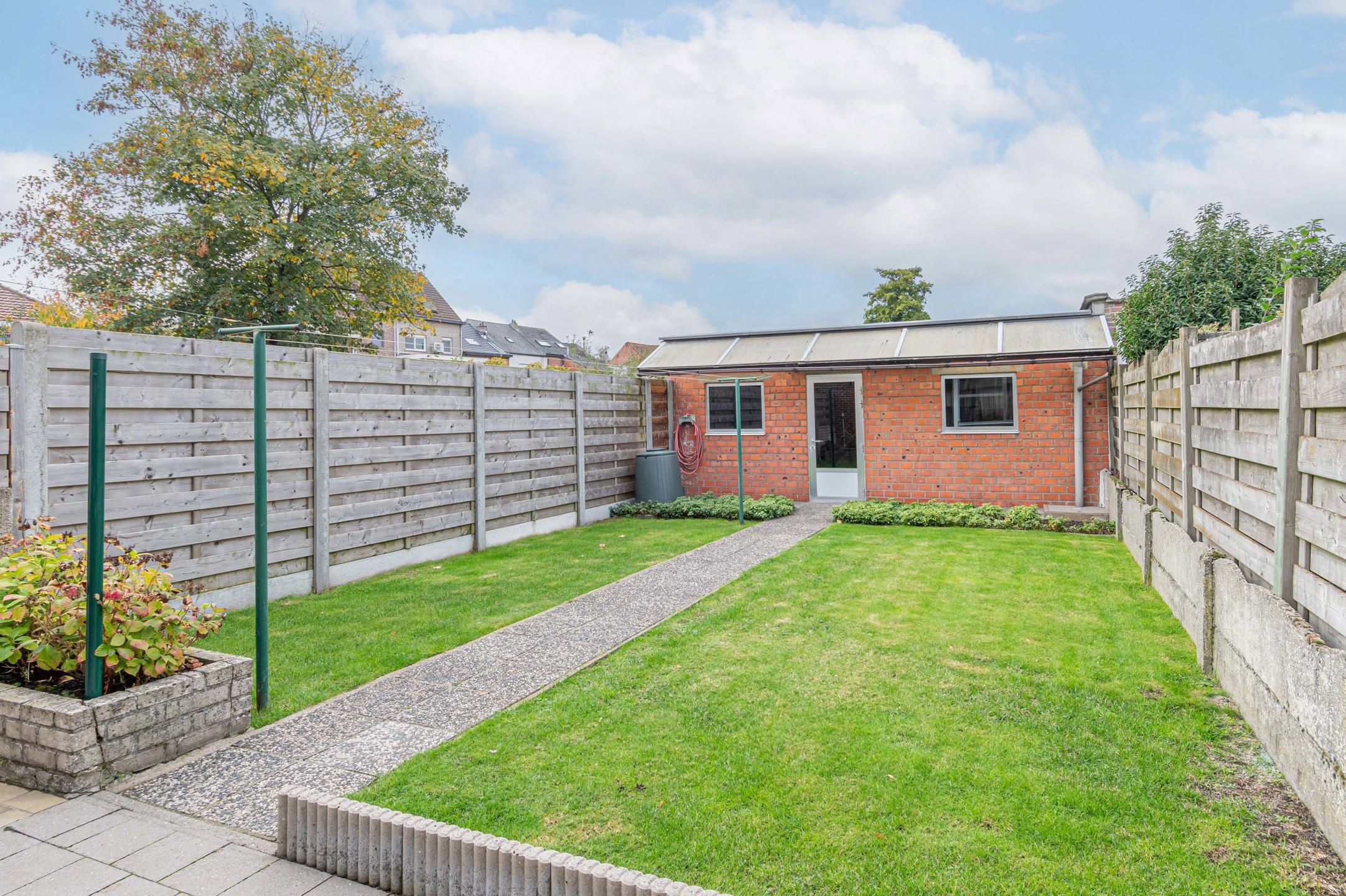 Gezellige gezinswoning met tuin en dubbele garage  foto 4