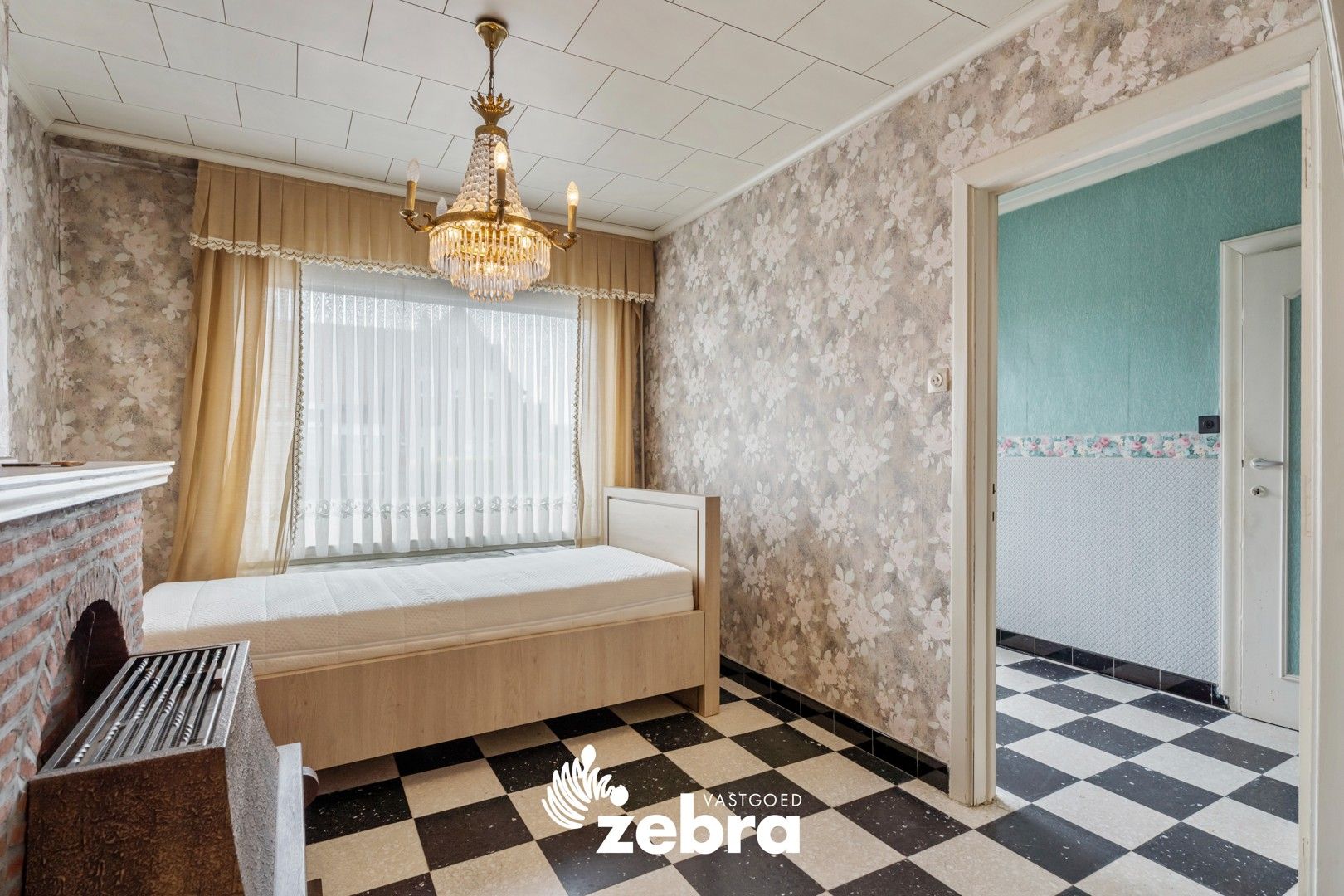 Te renoveren woning met 3 slaapkamers te Oostrozebeke! foto 3