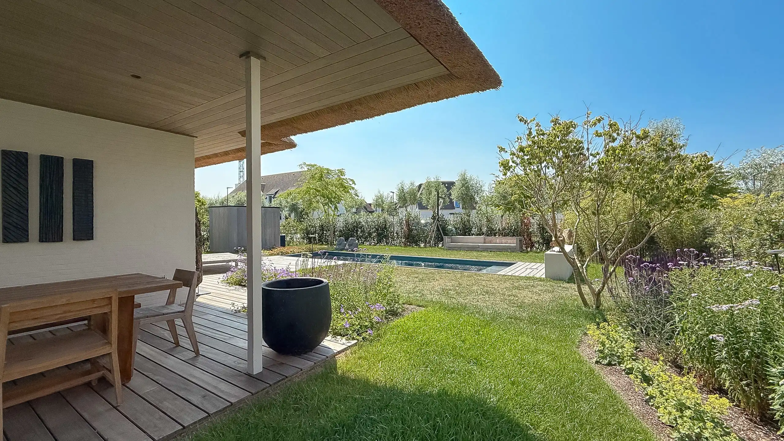 Nieuwbouwvilla met zonovergoten tuin en zwembad -Duinenwater foto 6