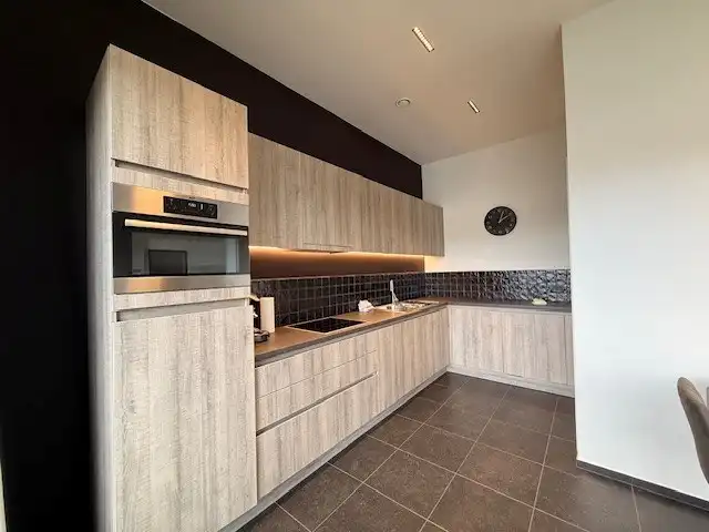 Nieuwbouwappartement met 1 slaapkamer, terras en autostandplaats te Maasmechelen. foto 5