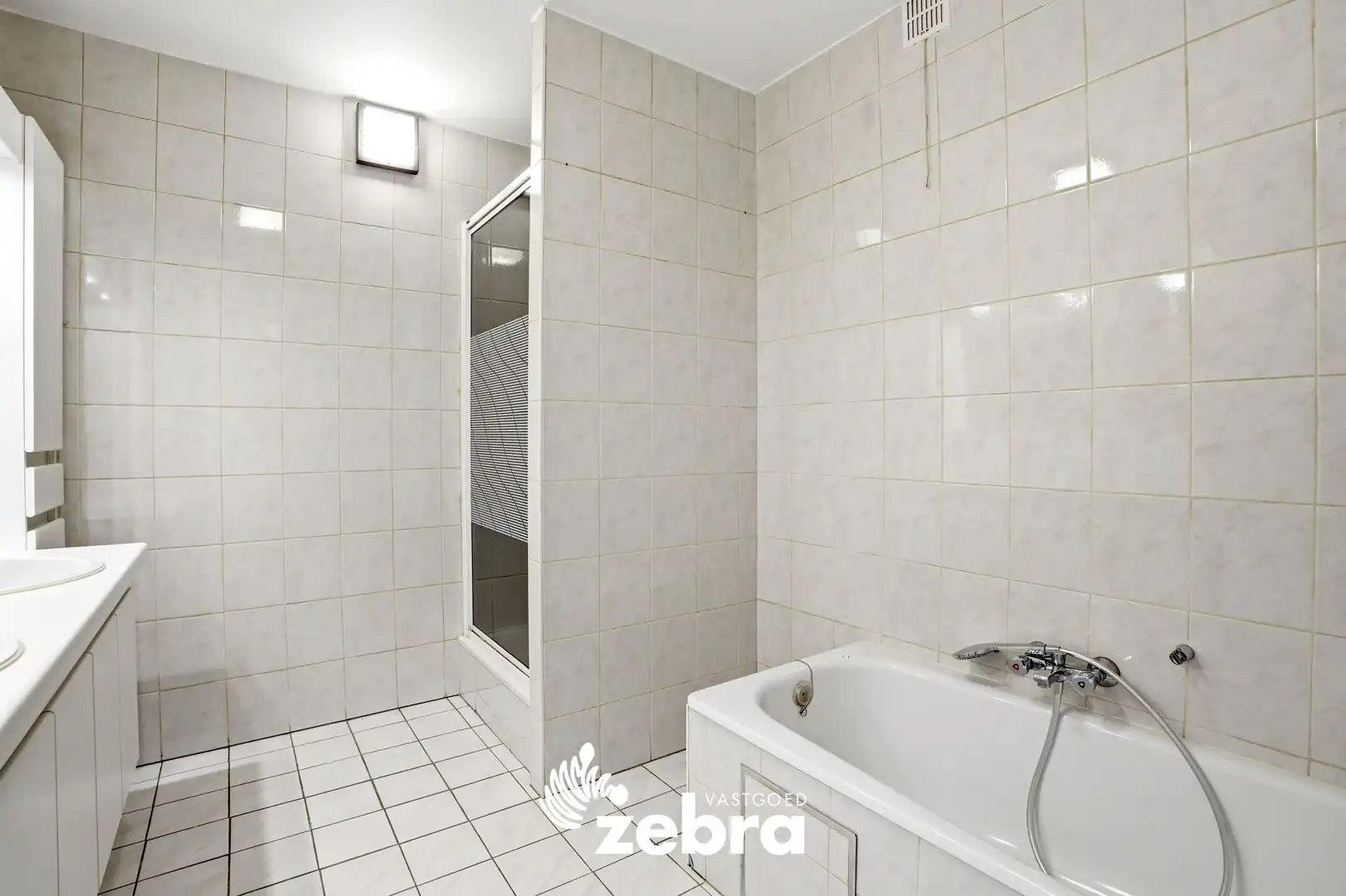 Zeer ruim appartement (137 m²) te koop met dubbele garage in het hartje van Tielt! foto 27