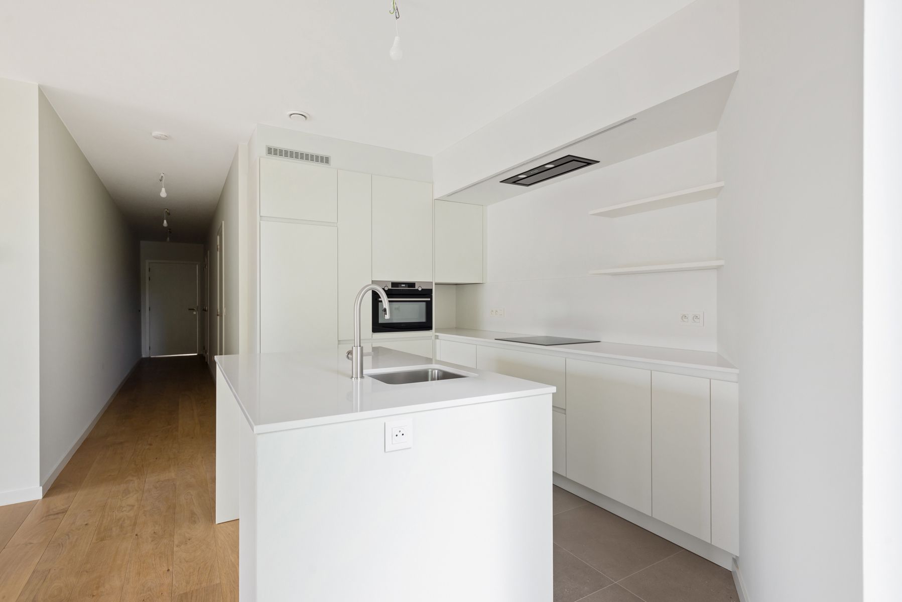 Nieuwbouwappartement met 1 slpk. + dressing/bureau en lift. foto 5