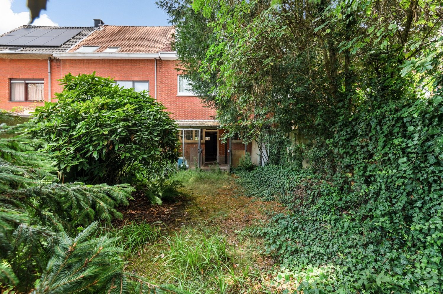 Ruime woning met 4 slaapkamers, garage & tuin in Borsbeek! foto 3