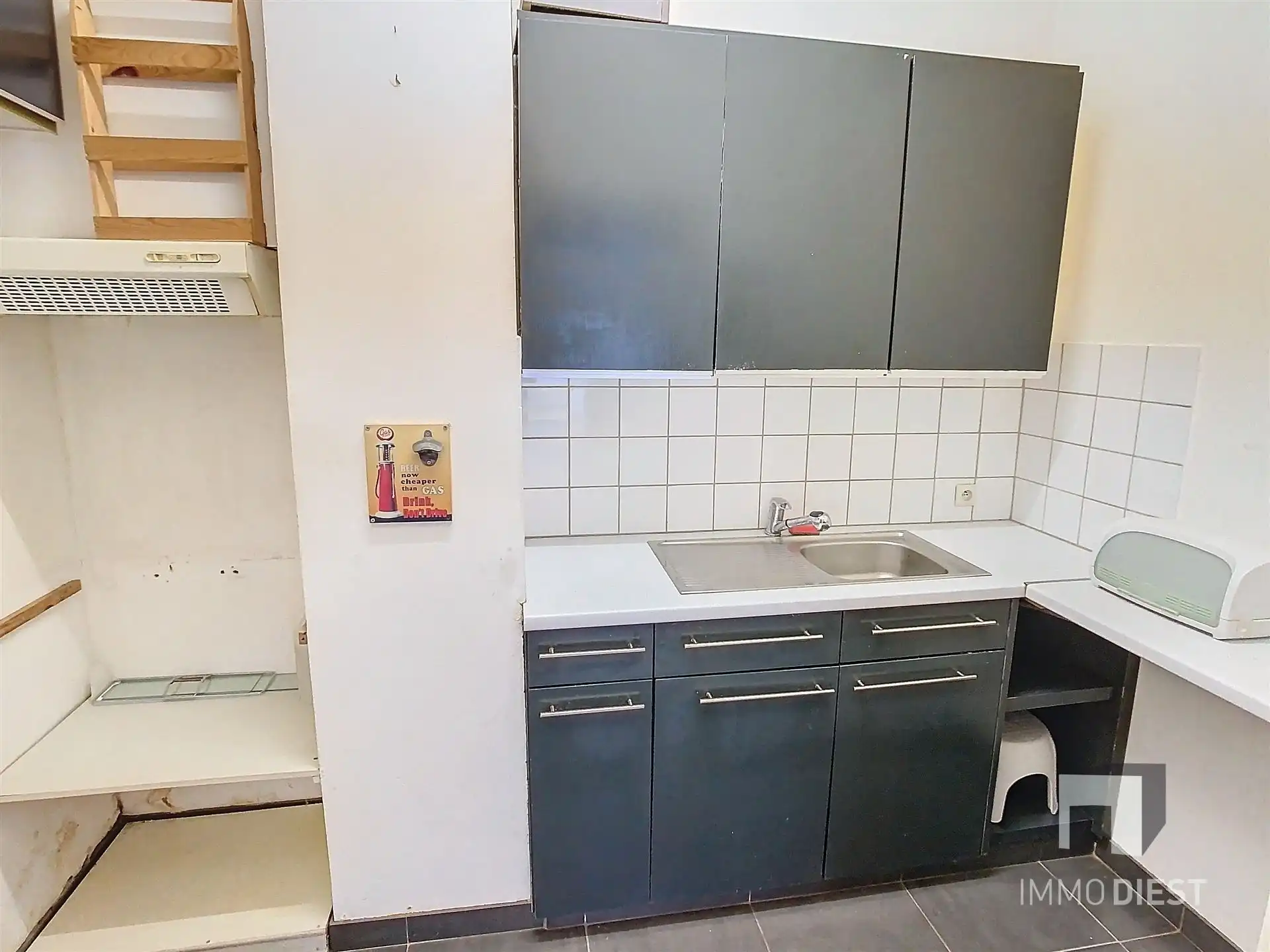 Handelsgelijkvloers met achterliggend appartement foto 17