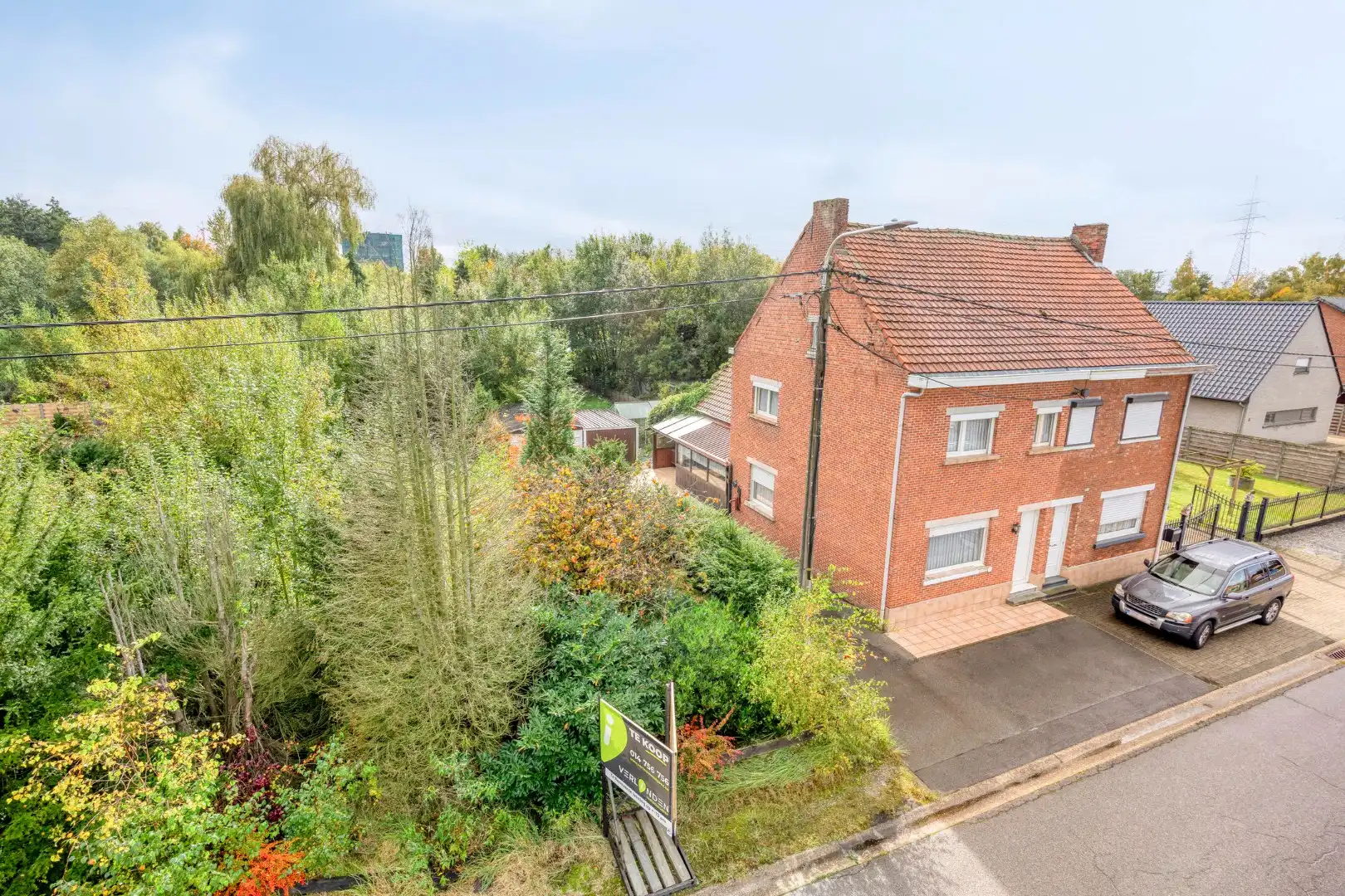 Rustig gelegen te renoveren woning op een mooi perceel van 13 are. foto 35